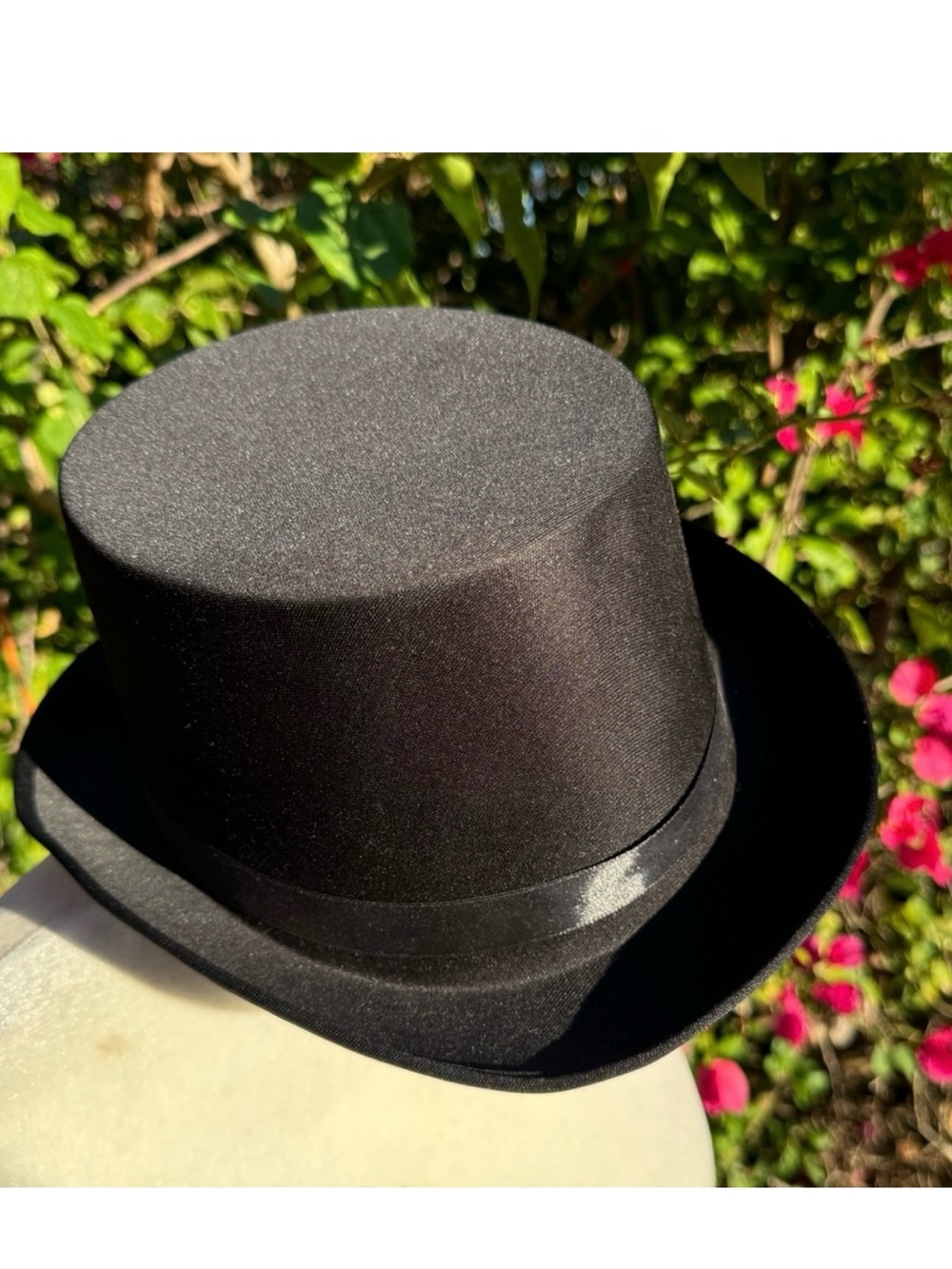 Vintage satin top hat with black ribbon band.Measurements in listing photo